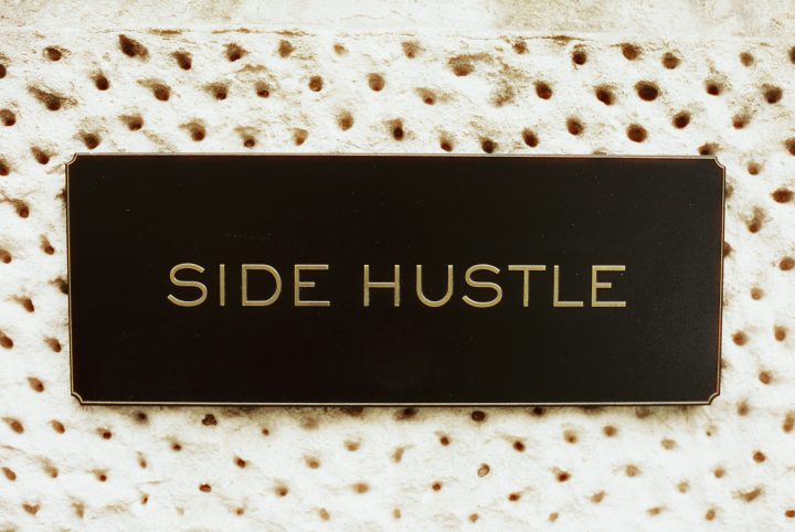 ide hustle text displayed on a brown background.